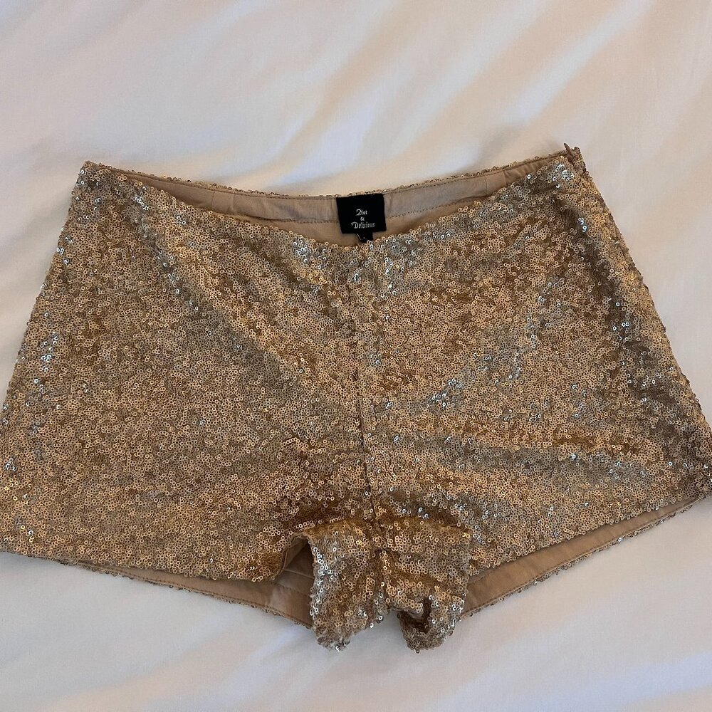Great for a fancy Spring Night! 
Gold Sparkling (sequin) Hot Shorts! 
Large